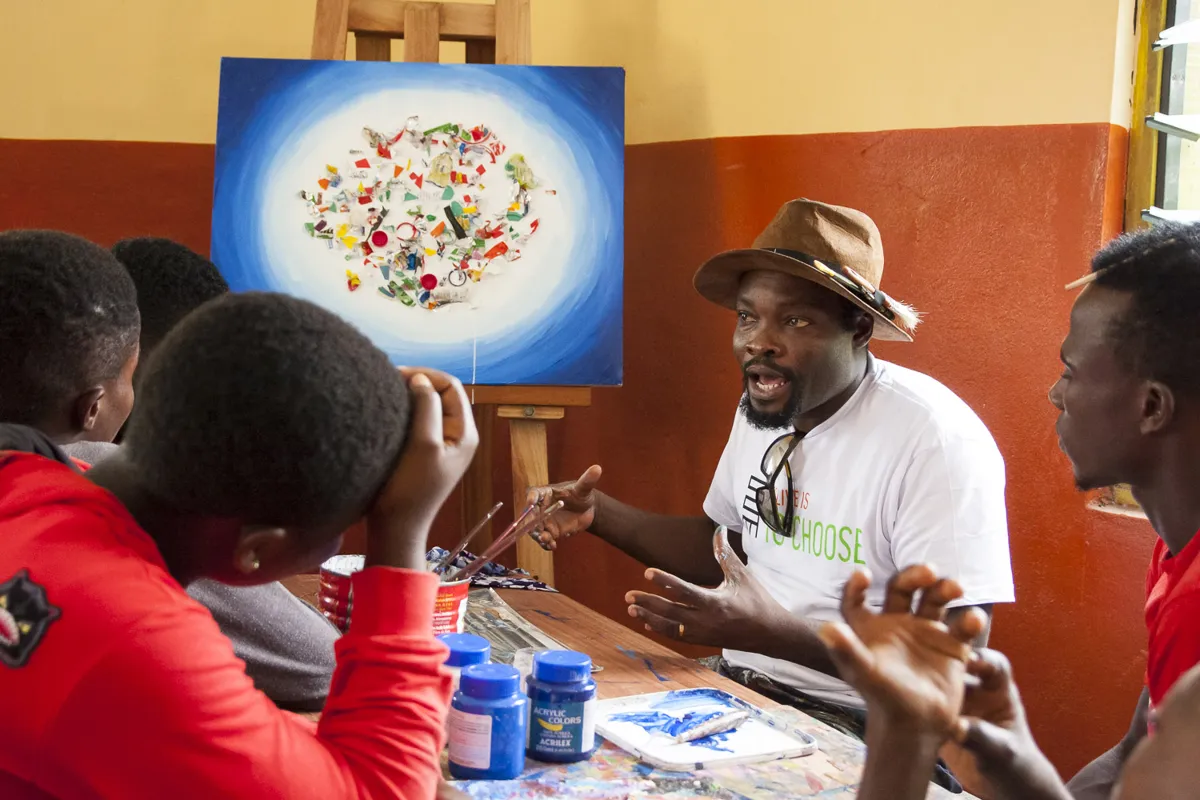 Workshop with young people around one of Kobina’s plastic paintings